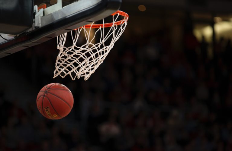 basketball going into hoop