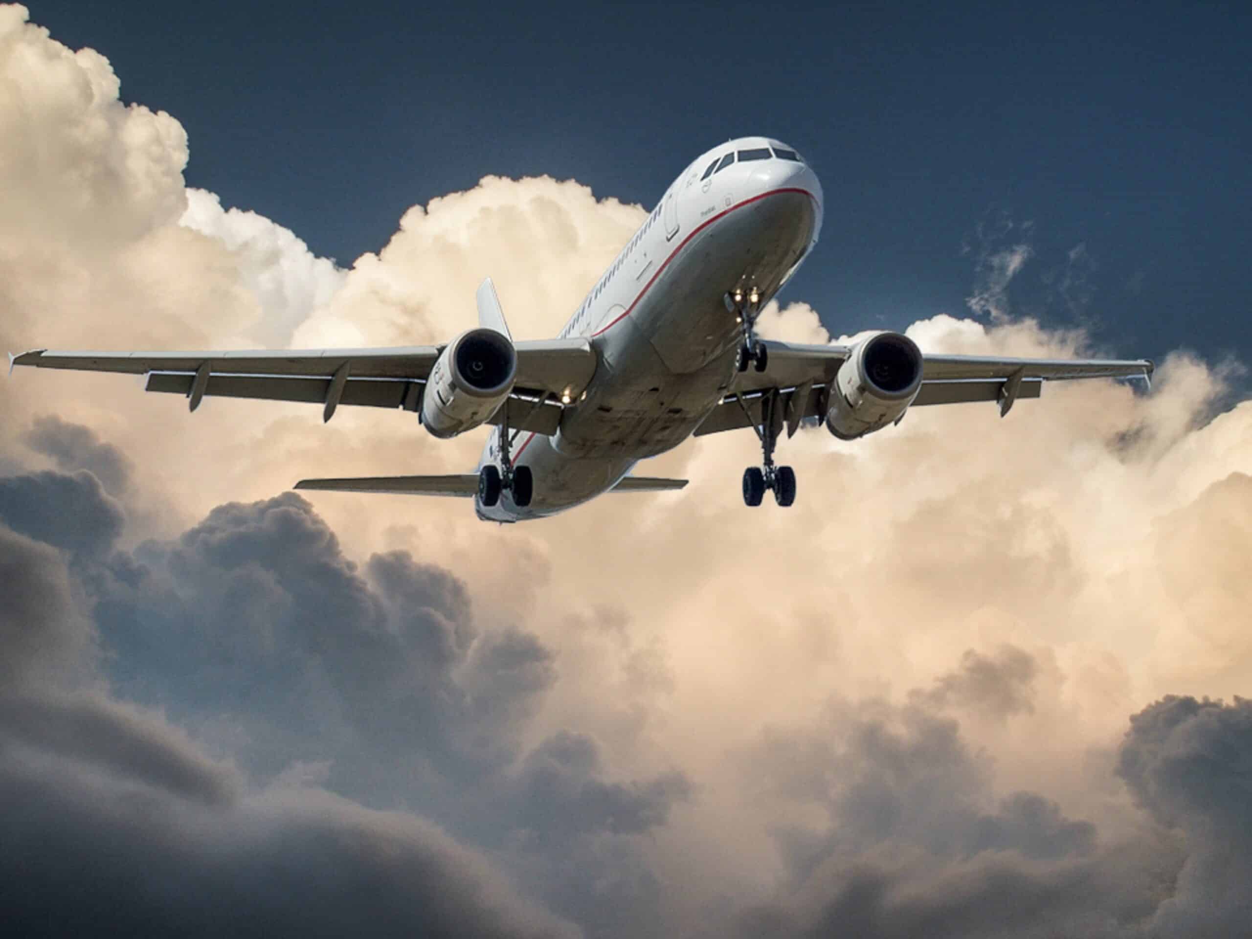 plane flying through clouds