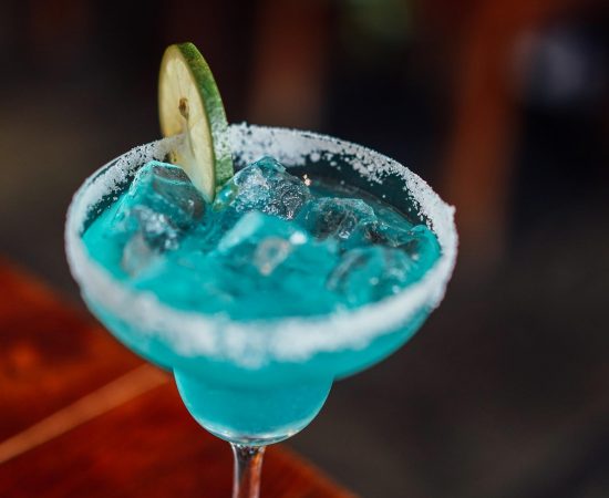 blue margarita in glass